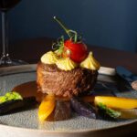 Bouchon Restaurant - image of gourmet food (beef fillet)